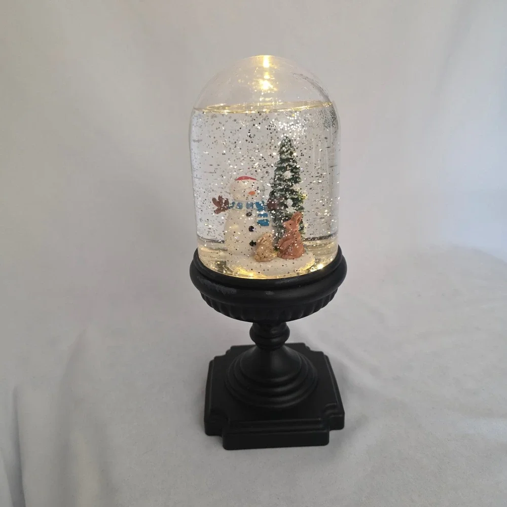Musical Lighted Snowman & Woodland Bunnies Snow Globe on Black Pedestal Base